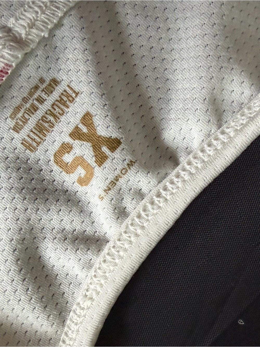 Tracksmith Cream Performance Tank with Rabbit Logo - Picture 10 of 11